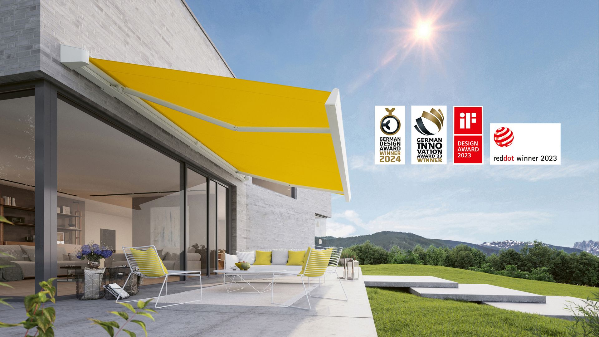Toldo enrollable «Markilux MX-2» blanco que da sombra a una terraza al estilo mallorquín