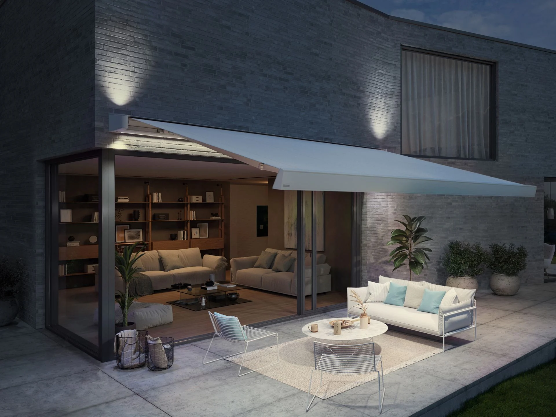 Toldo markilux MX-4 iluminando una terraza por la noche